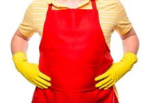 worker wearing a red apron