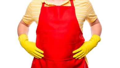 worker wearing a red apron